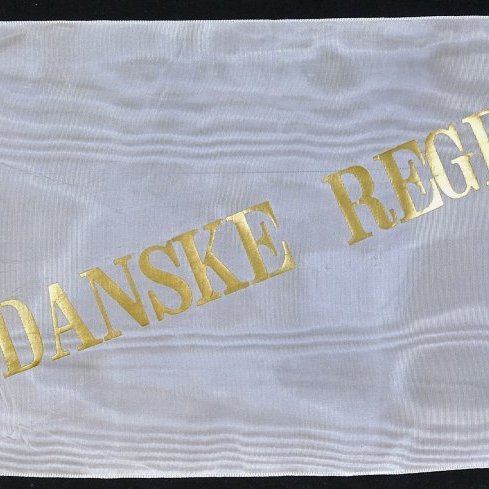 Borði 26: Den Danske Regering. Den Danske Regering.