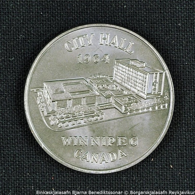 Peningur. Á framhlið peningsins stendur: CITY HALL 1964 WINNIPEG CANADA. Á bakhlið peningsins stendur: THE INTERNATIONAL NICKEL COMPANY OF CANADA LIMITED.